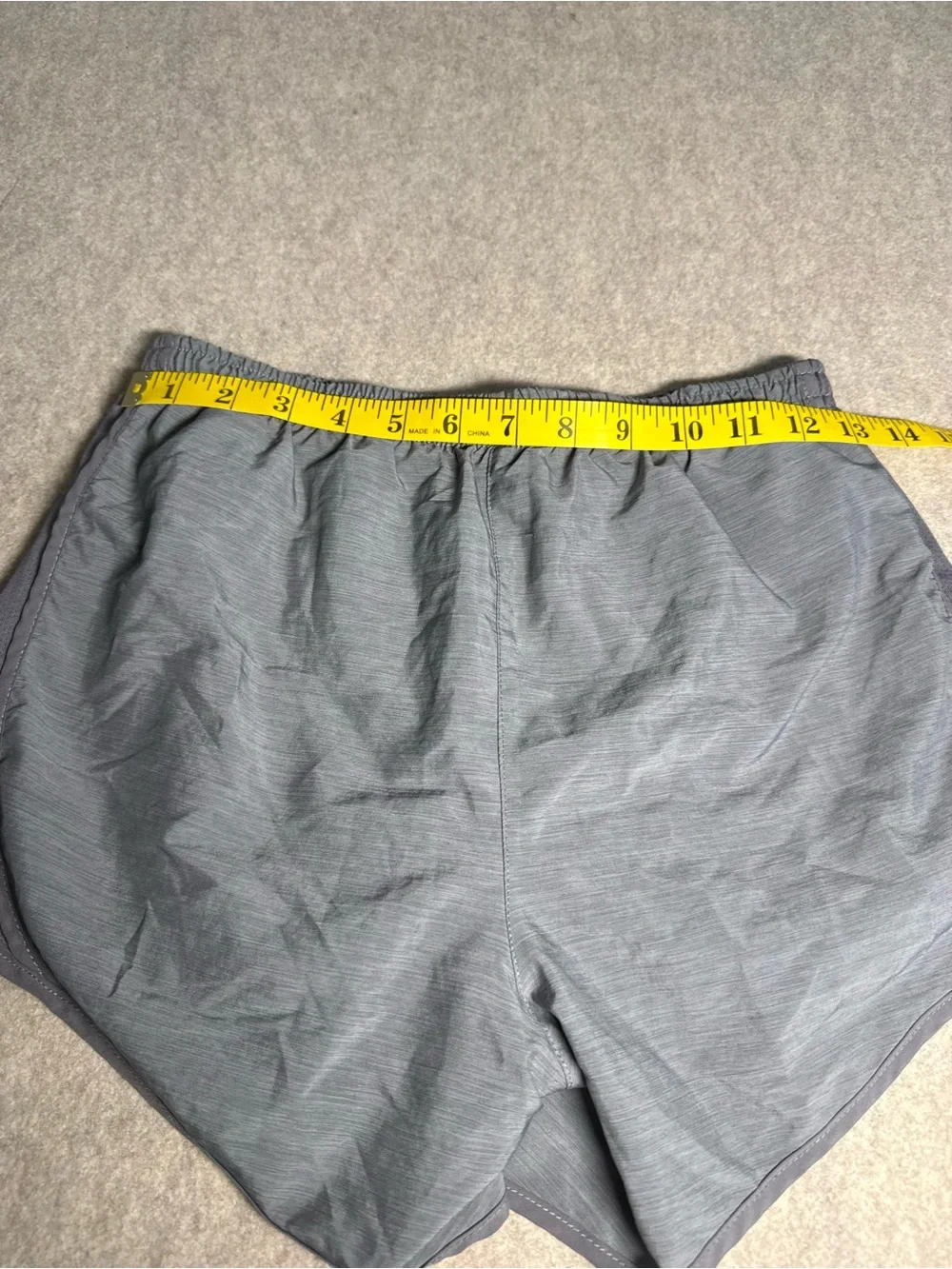 Nike Grey Athletic Shorts with White Swoosh